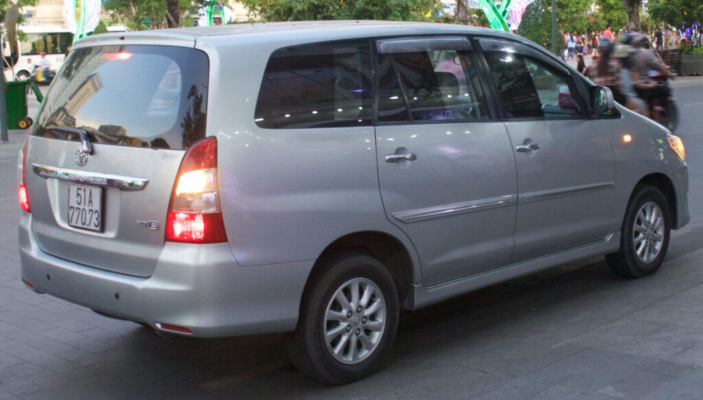 toyota innova crysta hire in delhi-Brown